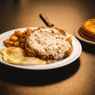 CHICKEN FRIED STEAK & EGGS